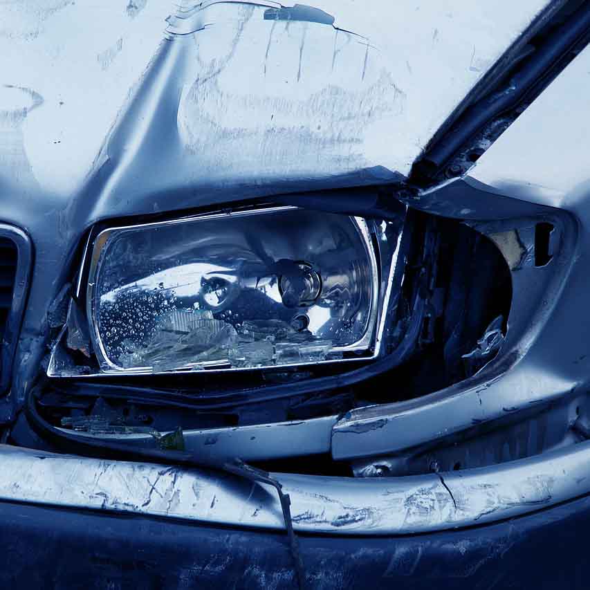 Broken car headlight after car crash